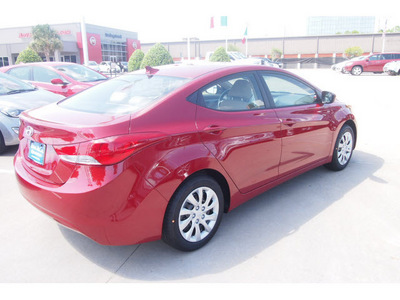 hyundai elantra 2013 red sedan gls gasoline 4 cylinders front wheel drive 6 speed manual 77074