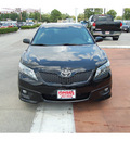 toyota camry 2011 black sedan se v6 gasoline 6 cylinders front wheel drive automatic with overdrive 77706