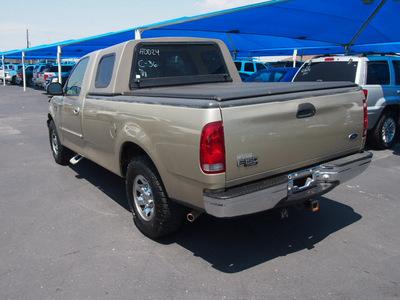 ford f 150 2000 gold pickup truck xlt gasoline v8 rear wheel drive automatic 76234