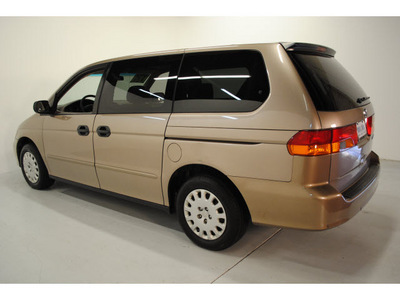 honda odyssey 2003 gold van lx gasoline 6 cylinders sohc front wheel drive automatic 77025