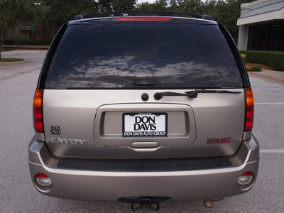 gmc envoy 2003 tan suv sle gasoline 6 cylinders 4 wheel drive automatic 76011