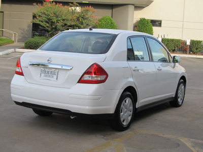 nissan versa 2011 white sedan 1 8 s gasoline 4 cylinders front wheel drive automatic with overdrive 77074