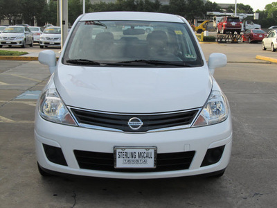 nissan versa 2011 white sedan 1 8 s gasoline 4 cylinders front wheel drive automatic with overdrive 77074