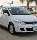 nissan versa 2011 white sedan 1 8 s gasoline 4 cylinders front wheel drive automatic with overdrive 77074