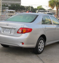 toyota corolla 2010 silver sedan le gasoline 4 cylinders front wheel drive automatic with overdrive 77074