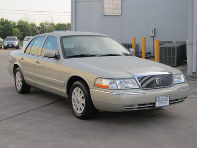 mercury grand marquis 2004 gold sedan gs gasoline 8 cylinders rear wheel drive automatic with overdrive 77074