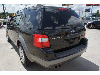 ford freestyle 2005 black suv sel gasoline 6 cylinders front wheel drive automatic 77039