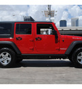 jeep wrangler unlimited 2011 red suv rubicon gasoline 6 cylinders 4 wheel drive automatic with overdrive 77002