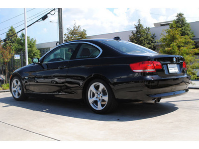 bmw 3 series 2009 black coupe 328i gasoline 6 cylinders rear wheel drive automatic 77002