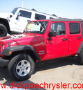 jeep wrangler unlimited 2011 red suv sport gasoline 6 cylinders 4 wheel drive automatic 79925