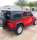 jeep wrangler unlimited 2011 red suv sport gasoline 6 cylinders 4 wheel drive automatic 76049