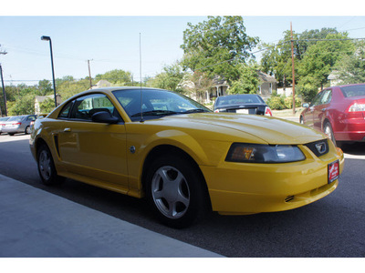 ford mustang 2004 yellow coupe gasoline 6 cylinders rear wheel drive automatic 76513