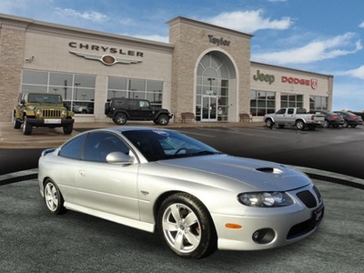 pontiac gto 2006 silver coupe gasoline 8 cylinders rear wheel drive 6 speed manual 60915