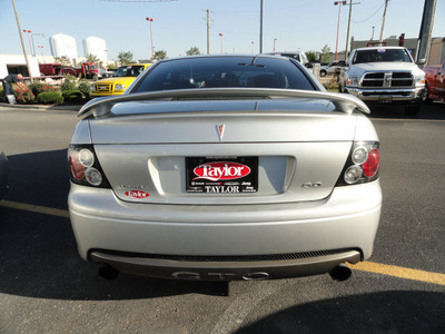 pontiac gto 2006 silver coupe gasoline 8 cylinders rear wheel drive 6 speed manual 60915