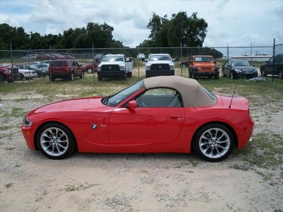 bmw z4 2005 red gasoline 6 cylinders rear wheel drive not specified 34731