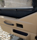 jeep wrangler 2002 black suv sahara gasoline 6 cylinders 4 wheel drive 5 speed manual 62034