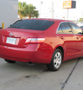 toyota camry 2009 red sedan le gasoline 4 cylinders front wheel drive automatic with overdrive 77074