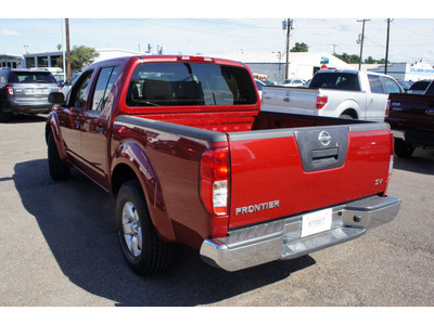 nissan frontier 2011 red sv v6 gasoline 6 cylinders 2 wheel drive automatic 78501