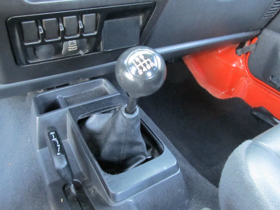 jeep wrangler 2006 orange suv se gasoline 4 cylinders 4 wheel drive 6 speed manual 77471