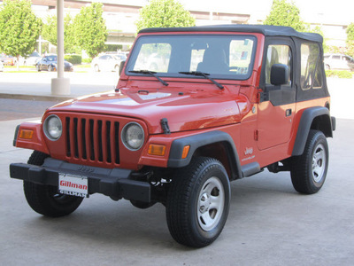 jeep wrangler 2006 orange suv se gasoline 4 cylinders 4 wheel drive 6 speed manual 77471