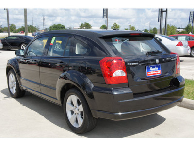 dodge caliber 2011 black wagon mainstreet gasoline 4 cylinders front wheel drive cont  variable trans  77090