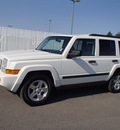 jeep commander 2006 white suv gasoline 6 cylinders 4 wheel drive automatic 99352
