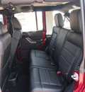 jeep wrangler unlimited 2012 red suv sport gasoline 6 cylinders 4 wheel drive automatic 79029