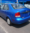 chevrolet aveo 2005 dk  blue sedan ls gasoline 4 cylinders front wheel drive automatic 76234