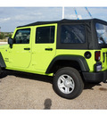 jeep wrangler unlimited 2012 green suv sport gasoline 6 cylinders 4 wheel drive 6 speed manual 76645