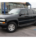 chevrolet suburban 2004 black suv 1500 z71 flex fuel 8 cylinders 4 wheel drive automatic 78753