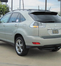 lexus rx 400h 2006 tan suv hybrid 6 cylinders front wheel drive automatic with overdrive 77074