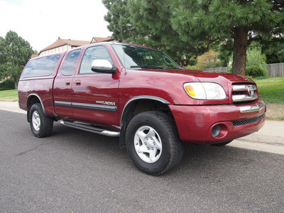 toyota tundra 2004 red sr5 4x4 v6 5spd 1 owner gasoline 6 cylinders 4 wheel drive 5 speed manual 80012