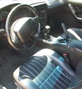 chevrolet camaro 2002 black hatchback gasoline 8 cylinders rear wheel drive standard 75041
