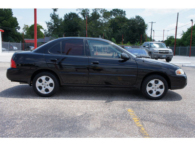 nissan sentra 2006 black sedan 1 8 gasoline 4 cylinders front wheel drive automatic 77008