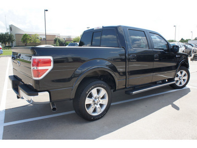 ford f 150 2011 black c c lariat flex fuel 8 cylinders 2 wheel drive automatic 77505