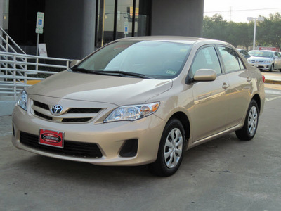 toyota corolla 2011 tan sedan le gasoline 4 cylinders front wheel drive automatic with overdrive 77074