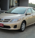 toyota corolla 2011 tan sedan le gasoline 4 cylinders front wheel drive automatic with overdrive 77074