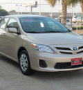 toyota corolla 2011 tan sedan le gasoline 4 cylinders front wheel drive automatic with overdrive 77074