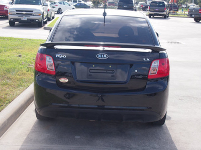 kia rio 2011 black sedan gasoline 4 cylinders front wheel drive automatic 77090