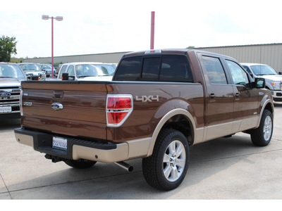 ford f 150 2012 brown lariat gasoline 6 cylinders 4 wheel drive automatic 76567