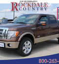 ford f 150 2012 brown lariat gasoline 6 cylinders 4 wheel drive automatic 76567