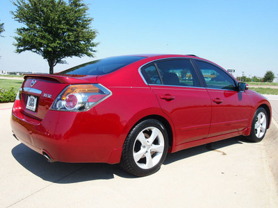 nissan altima 2007 dk  red sedan 3 5 se gasoline 6 cylinders front wheel drive automatic 76018