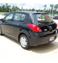 nissan versa 2011 black hatchback 1 8 s gasoline 4 cylinders front wheel drive automatic with overdrive 77656