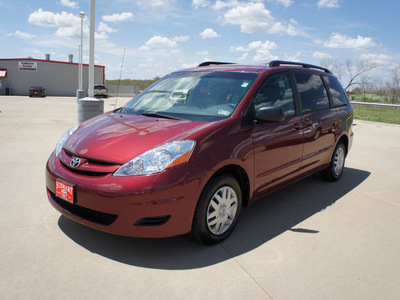 toyota sienna 2010 dk  red van le 8 passenger gasoline 6 cylinders front wheel drive automatic 75110