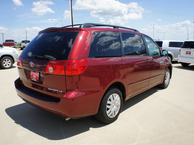 toyota sienna 2010 dk  red van le 8 passenger gasoline 6 cylinders front wheel drive automatic 75110