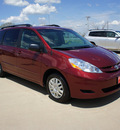 toyota sienna 2010 dk  red van le 8 passenger gasoline 6 cylinders front wheel drive automatic 75110