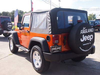 jeep wrangler 2011 orange suv sport gasoline 6 cylinders 4 wheel drive automatic 77515