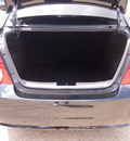 chevrolet sonic 2012 black sedan lt gasoline 4 cylinders front wheel drive shiftable automatic 77566