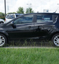 chevrolet sonic 2012 black hatchback lt gasoline 4 cylinders front wheel drive standard 77090