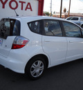 honda fit 2010 white hatchback gasoline 4 cylinders front wheel drive automatic 79925